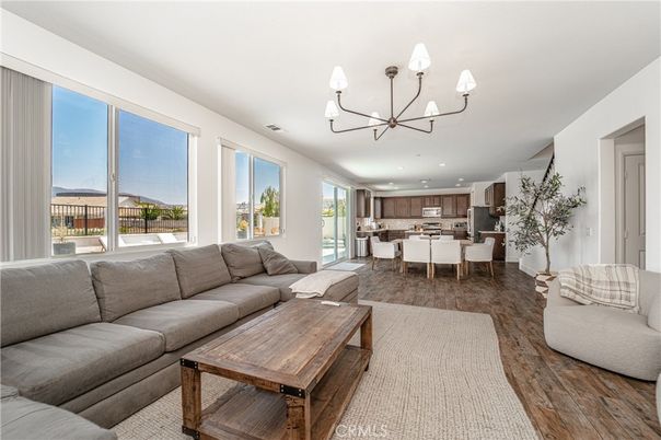Chandelier, Dining room, Interior, Kitchen, Living room, Recessed Lighting, Stainless Steel Appliances, Wood Texture Flooring