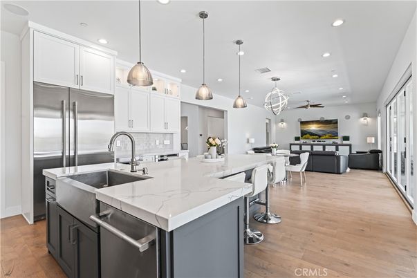 Dining room, Interior, Kitchen, Living room, Pendant Lights, Recessed Lighting, Stainless Steel Appliances, Wood Texture Flooring