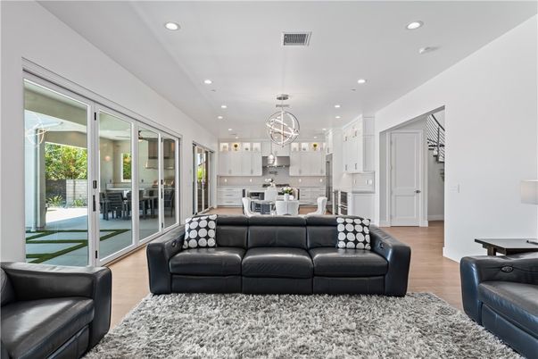 Chandelier, Dining room, Interior, Kitchen, Living room, Pendant Lights, Recessed Lighting, Wood Texture Flooring
