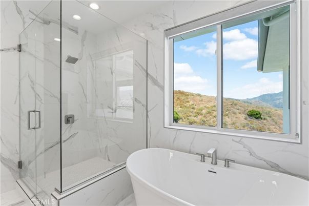 Bathroom, Free Standing Baths, Glass Shower, Interior, Marble Walls, Recessed Lighting