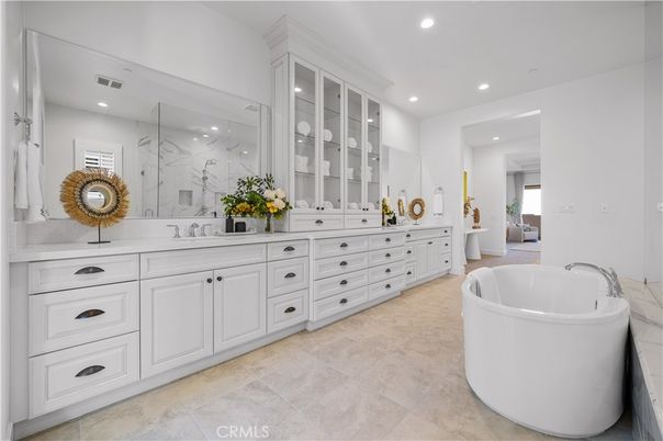 Bathroom, Dual Sink Vanities, Free Standing Baths, Glass Shower, Interior, Marble Walls, Recessed Lighting