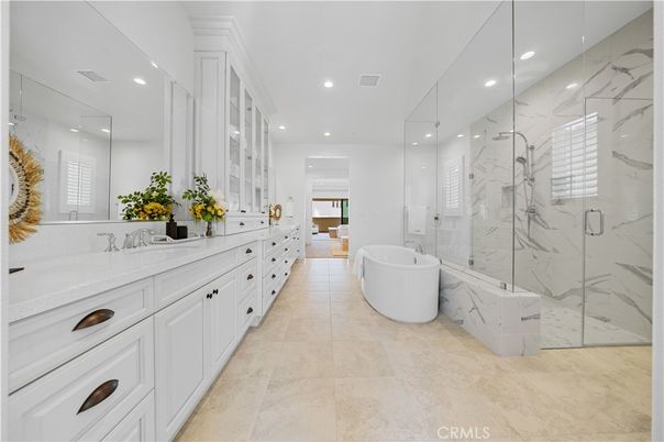 Bathroom, Dual Sink Vanities, Free Standing Baths, Glass Shower, Interior, Marble Walls, Recessed Lighting