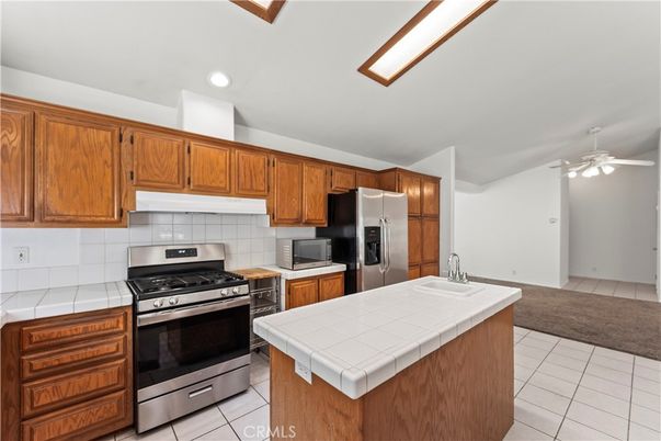 Interior, Kitchen, Recessed Lighting, Stainless Steel Appliances, Tile Countertops