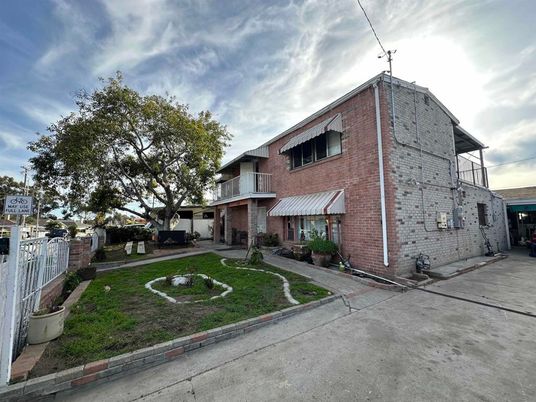 Exterior, Facade, Brick Facade, Condo Building