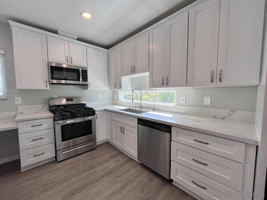 Interior, Kitchen, Recessed Lighting, Stainless Steel Appliances, Wood Texture Flooring
