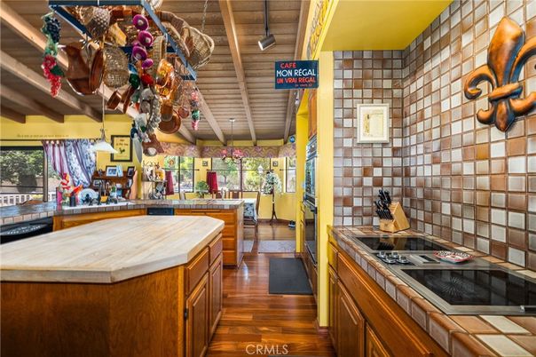 Interior, Kitchen, Stone Walls, Tile Countertops, Wood Texture Flooring