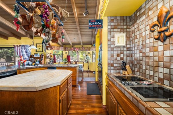 Interior, Kitchen, Stone Walls, Tile Countertops, Wood Texture Flooring