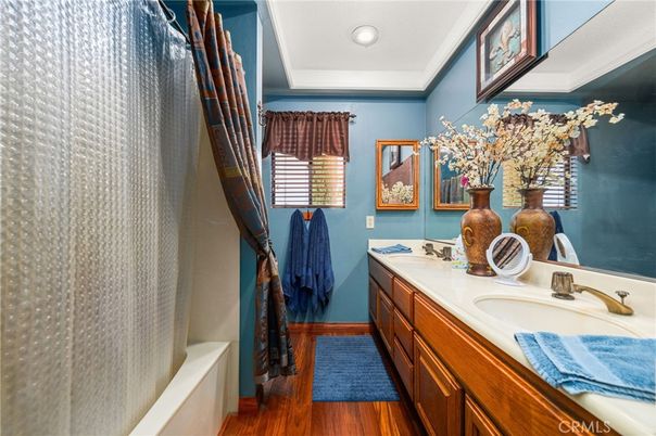 Bathroom, Dual Sink Vanities, Interior, Recessed Lighting, Wood Texture Flooring
