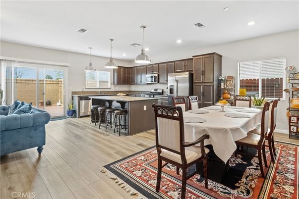 Dining room, Interior, Kitchen, Pendant Lights, Recessed Lighting, Stainless Steel Appliances, Wood Texture Flooring