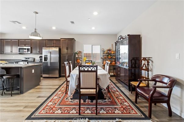 Dining room, Interior, Kitchen, Pendant Lights, Recessed Lighting, Stainless Steel Appliances, Wood Texture Flooring
