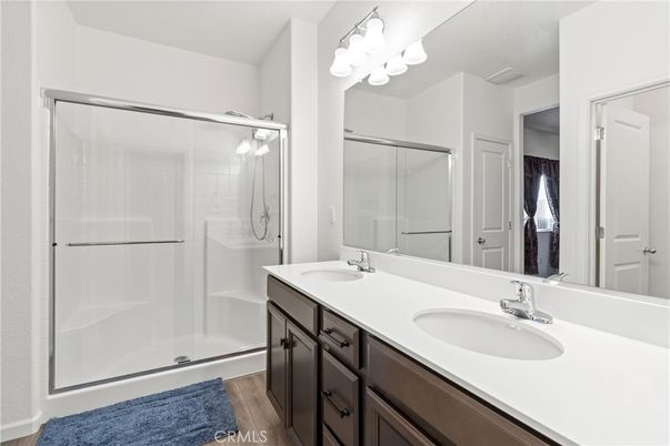 Bathroom, Dual Sink Vanities, Glass Shower, Interior, Wood Texture Flooring