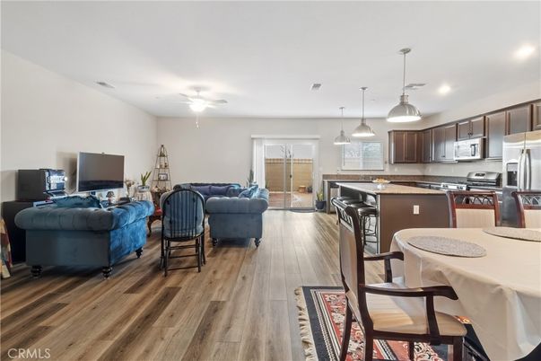 Dining room, Interior, Kitchen, Living room, Pendant Lights, Recessed Lighting, Stainless Steel Appliances, Wood Texture Flooring
