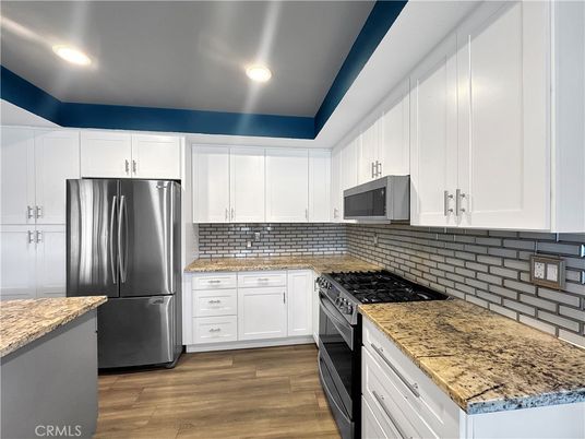 Interior, Kitchen, Recessed Lighting, Stainless Steel Appliances, Wood Texture Flooring