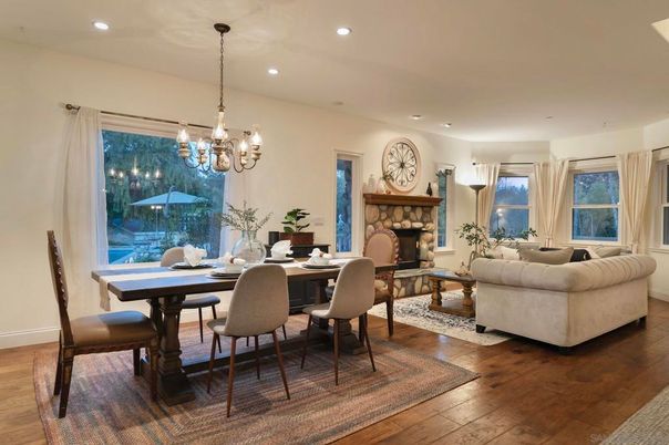Chandelier, Dining room, Fireplace, Interior, Living room, Recessed Lighting, Wood Texture Flooring