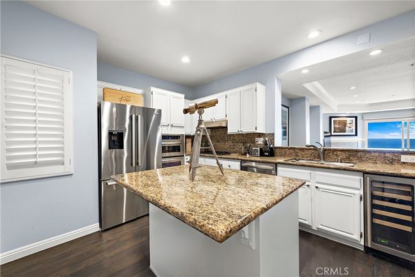 Interior, Kitchen, Recessed Lighting, Stainless Steel Appliances, Water, Wood Texture Flooring