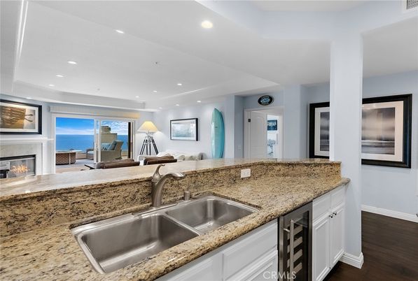Fireplace, Interior, Living room, Recessed Lighting, Water, Wood Texture Flooring