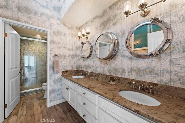 Bathroom, Dual Sink Vanities, Glass Shower, Interior, Wood Texture Flooring