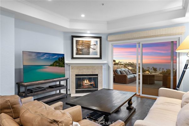 Fireplace, Interior, Living room, Recessed Lighting, Water, Wood Texture Flooring