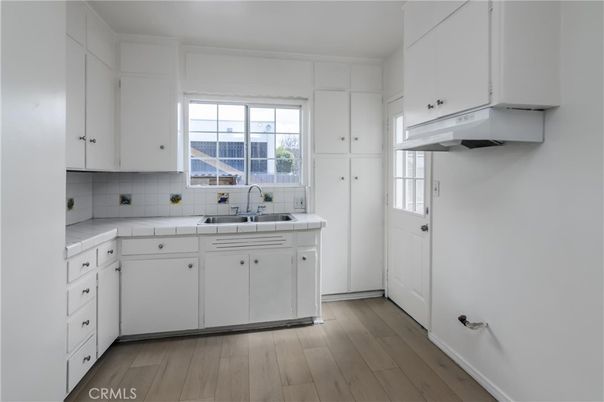 Interior, Kitchen, Tile Countertops, Wood Texture Flooring