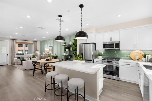 Dining room, Interior, Kitchen, Living room, Pendant Lights, Recessed Lighting, Stainless Steel Appliances, Wood Texture Flooring