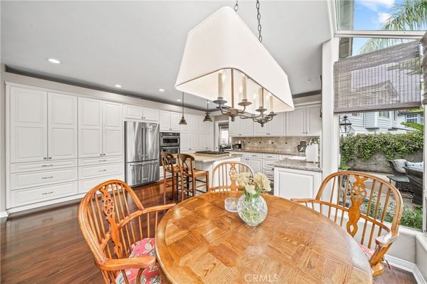 Dining room, Interior, Kitchen, Recessed Lighting, Stainless Steel Appliances, Wood Texture Flooring