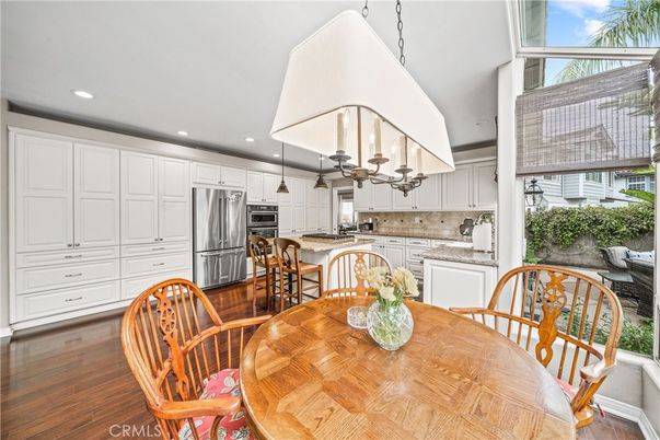 Dining room, Interior, Kitchen, Recessed Lighting, Stainless Steel Appliances, Wood Texture Flooring
