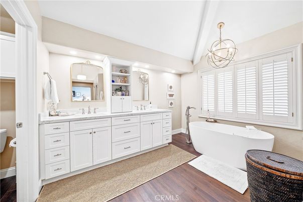 Bathroom, Dual Sink Vanities, Free Standing Baths, Interior, Pendant Lights, Recessed Lighting, Wood Texture Flooring