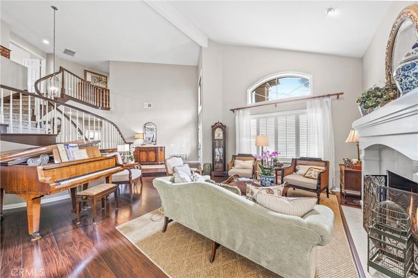 Fireplace, Interior, Living room, Piano, Recessed Lighting, Wood Texture Flooring