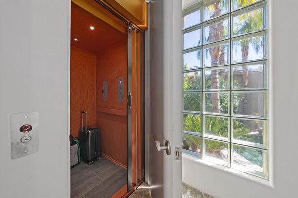Elevator, Interior, Recessed Lighting, Wood Texture Flooring, Wooden Walls