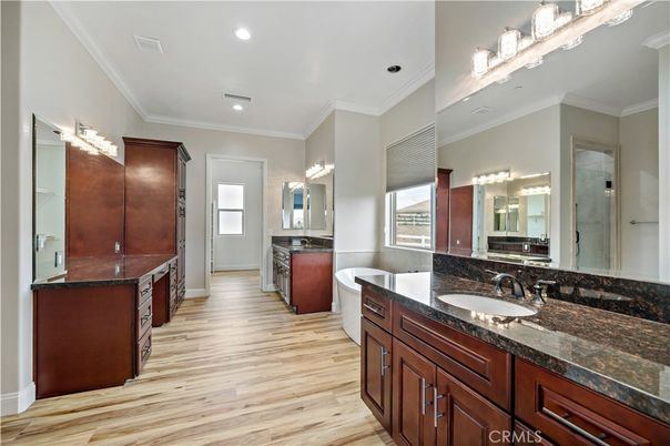 Bathroom, Dual Sink Vanities, Interior, Recessed Lighting, Wood Texture Flooring