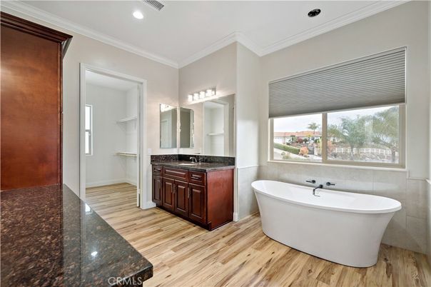 Bathroom, Dual Sink Vanities, Free Standing Baths, Interior, Recessed Lighting, Wood Texture Flooring