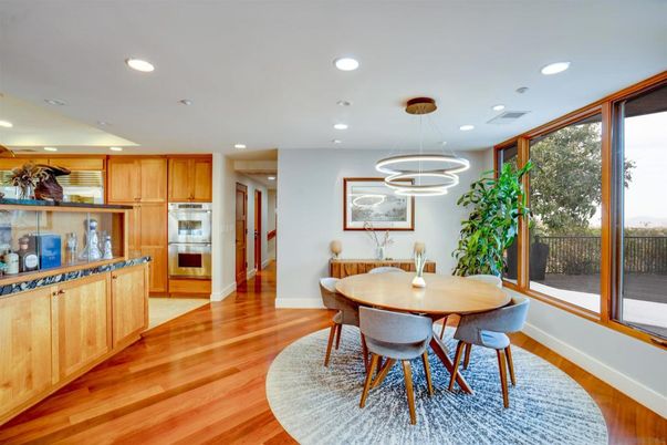 Dining room, Interior, Kitchen, Pendant Lights, Recessed Lighting, Stainless Steel Appliances, Wood Texture Flooring