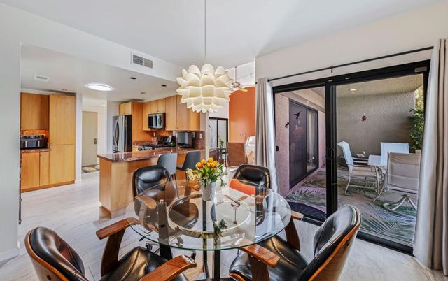 Chandelier, Dining room, Interior, Kitchen, Marble, Pendant Lights, Recessed Lighting, Stainless Steel Appliances