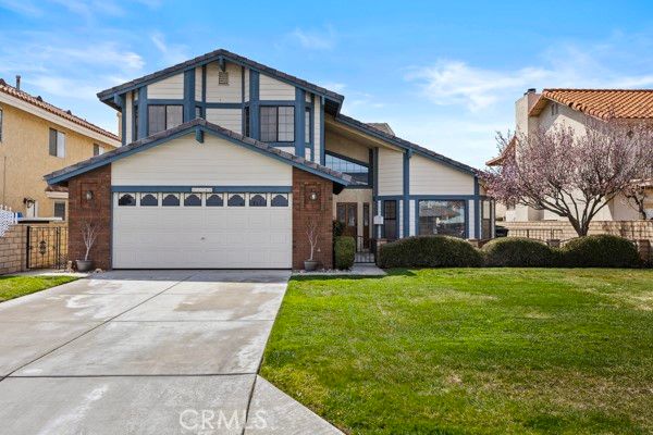 Attached, Backyard, Exterior, Facade, Brick Facade, Tudor Revival