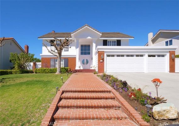 Attached, Exterior, Facade, Brick Facade, Spanish Mediterranean