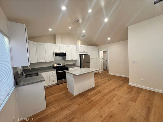 Interior, Kitchen, Pendant Lights, Recessed Lighting, Stainless Steel Appliances, Wood Texture Flooring