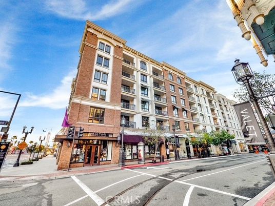 Exterior, Facade, Brick Facade, Condo Building