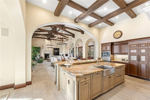 Chandelier, Dining room, Fireplace, Interior, Kitchen, Pendant Lights, Recessed Lighting, Stainless Steel Appliances, Wooden Beams