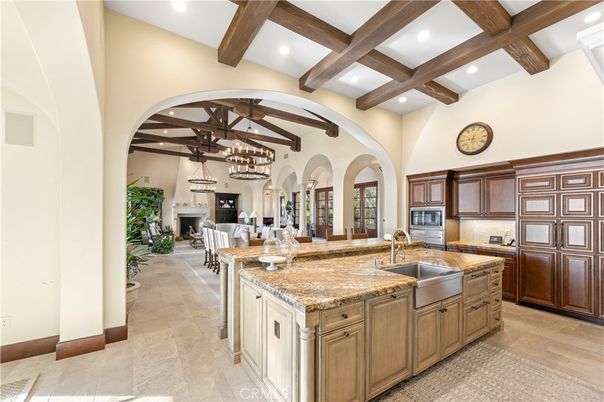 Chandelier, Dining room, Fireplace, Interior, Kitchen, Pendant Lights, Recessed Lighting, Stainless Steel Appliances, Wooden Beams
