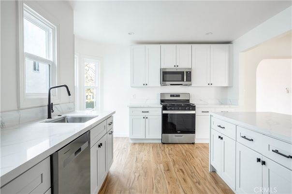 Interior, Kitchen, Recessed Lighting, Stainless Steel Appliances, Wood Texture Flooring