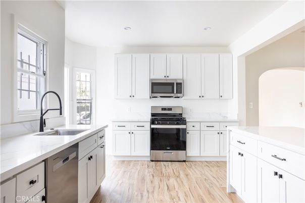 Interior, Kitchen, Recessed Lighting, Stainless Steel Appliances, Wood Texture Flooring