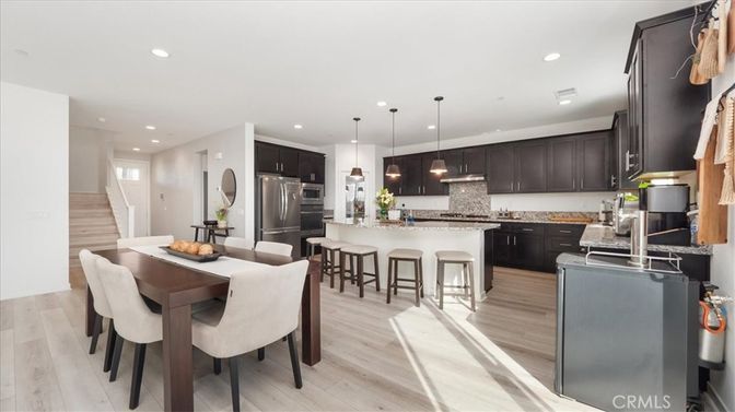 Dining room, Interior, Kitchen, Pendant Lights, Recessed Lighting, Stainless Steel Appliances, Wood Texture Flooring