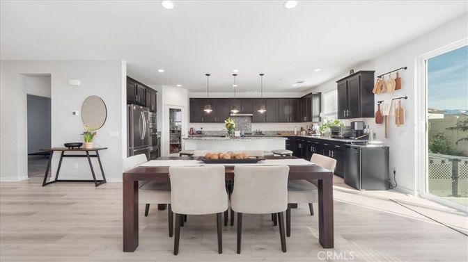 Dining room, Interior, Kitchen, Pendant Lights, Recessed Lighting, Stainless Steel Appliances, Wood Texture Flooring