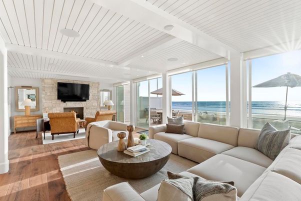 Fireplace, Interior, Living room, Recessed Lighting, Stone Walls, Water, Wood Texture Flooring