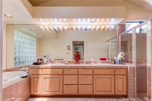 Bathroom, Dual Sink Vanities, Glass Shower, Interior, Recessed Lighting, Tile Countertops