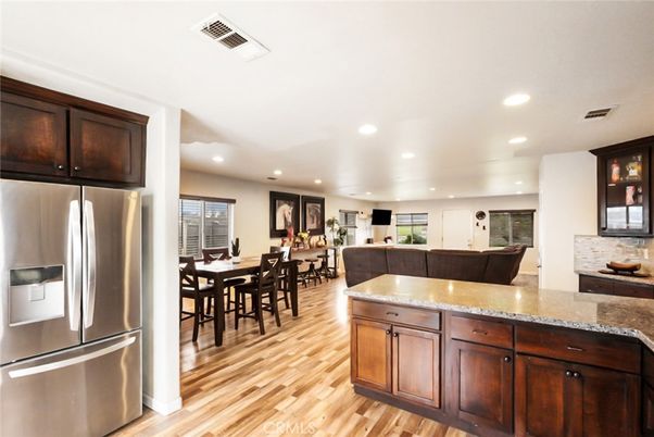Dining room, Interior, Kitchen, Recessed Lighting, Stainless Steel Appliances, Wood Texture Flooring