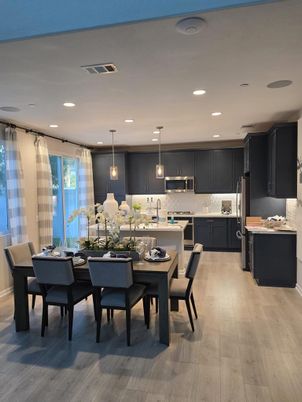 Dining room, Interior, Kitchen, Pendant Lights, Recessed Lighting, Stainless Steel Appliances, Wood Texture Flooring