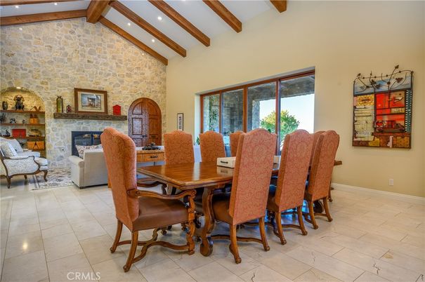 Dining room, Fireplace, Interior, Living room, Recessed Lighting, Stone Walls, Wooden Beams