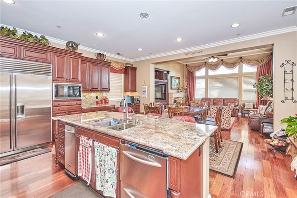 Dining room, Interior, Kitchen, Living room, Recessed Lighting, Stainless Steel Appliances, Wood Texture Flooring