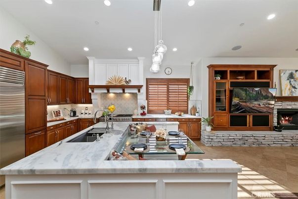 Fireplace, Interior, Kitchen, Pendant Lights, Recessed Lighting, Stainless Steel Appliances